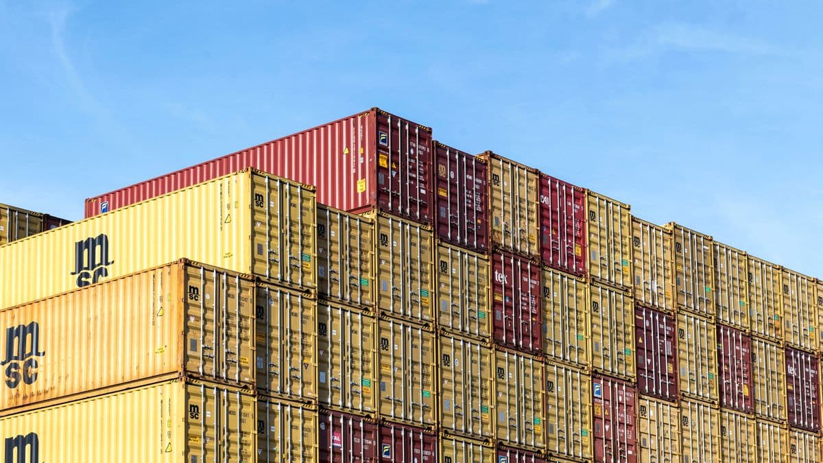 Shipping containers stacked at a freight terminal